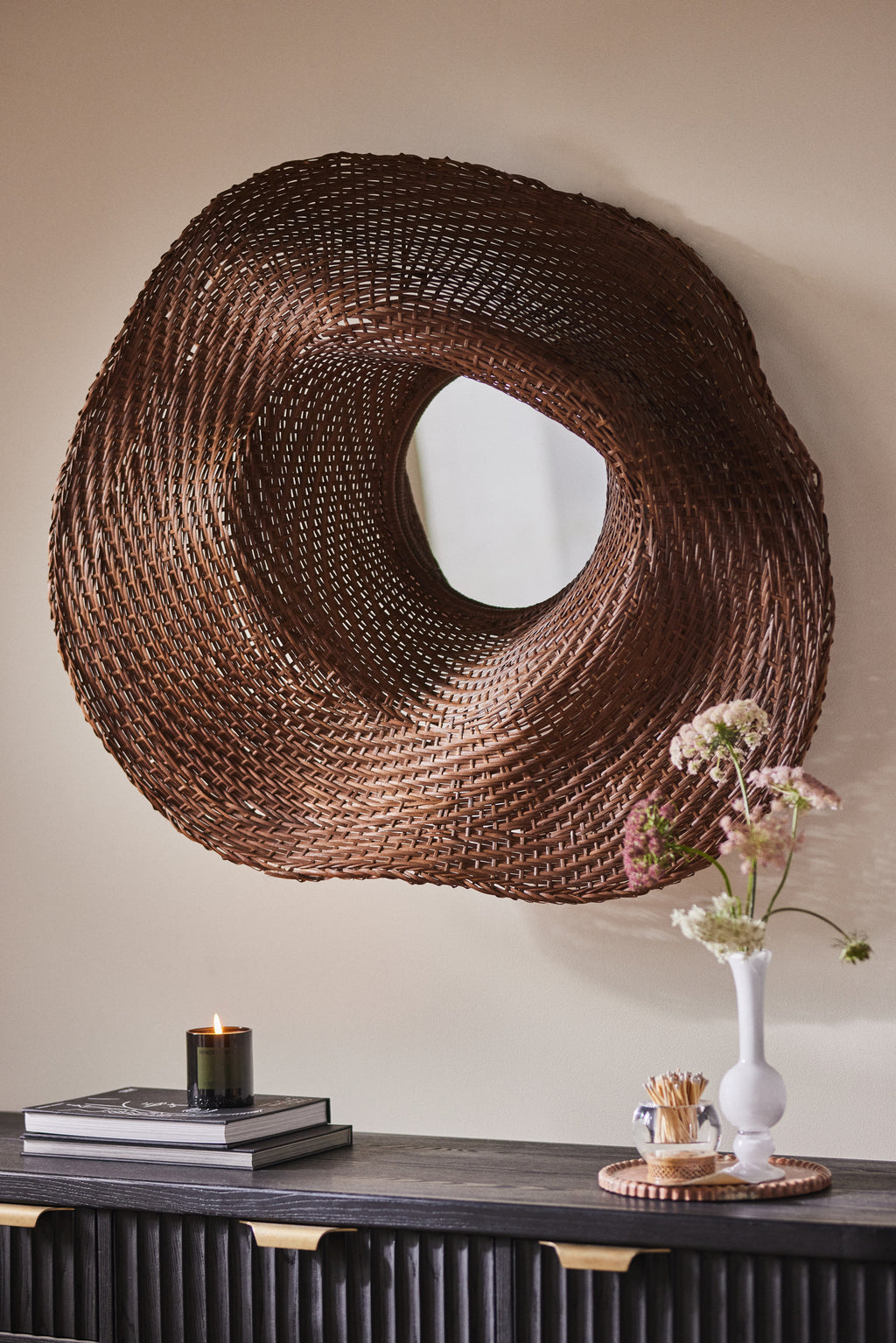 Askja Sculptural Woven Rattan Round Wall Mirror in Brown, product view 1