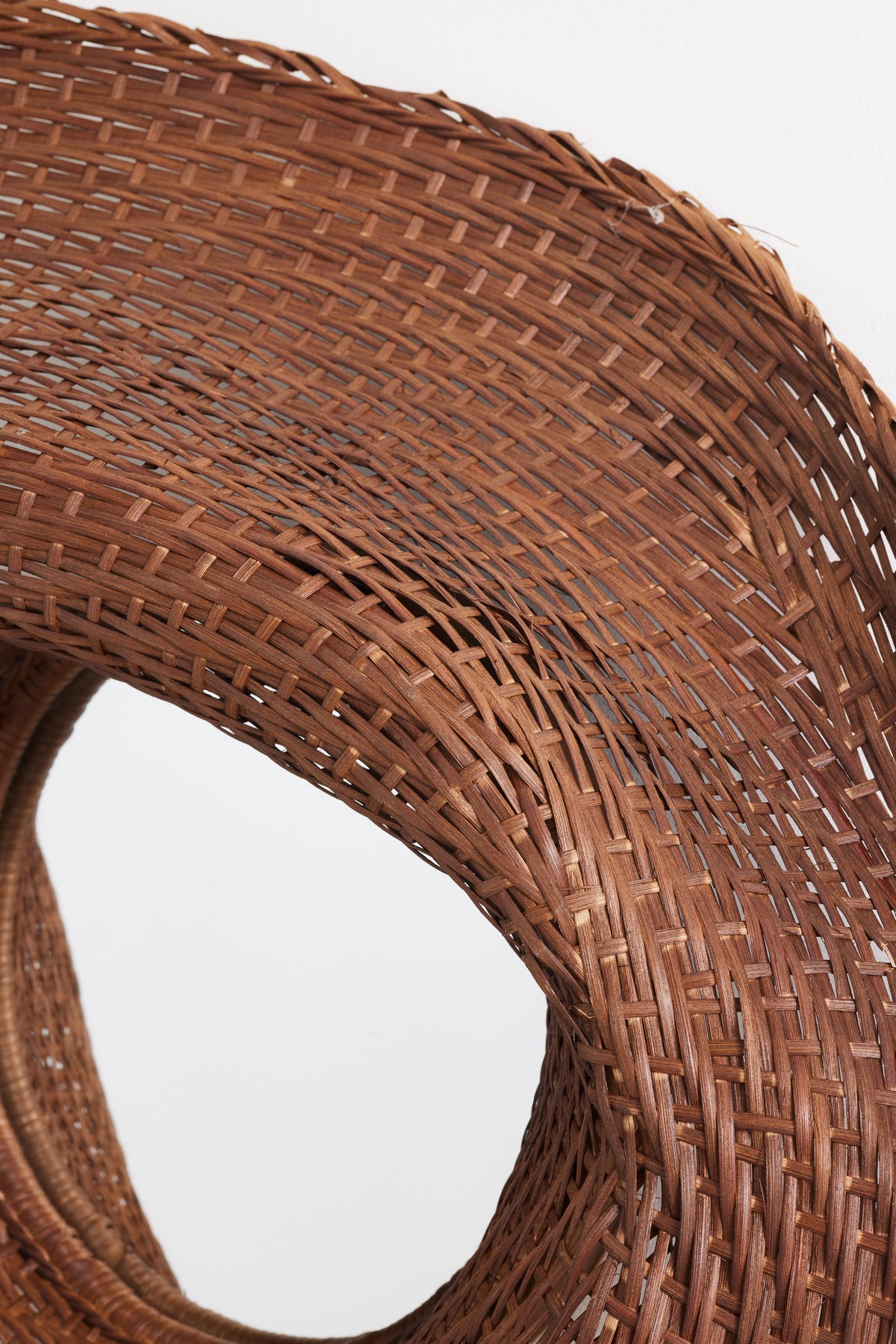 Askja Sculptural Woven Rattan Round Wall Mirror in Brown, product view 3